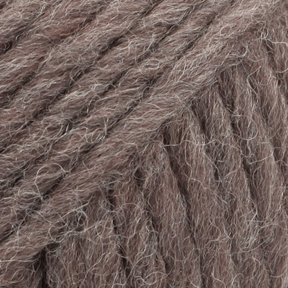 Close-up of a ball of brown-colored wool yarn from Drops