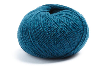 Deep teal ball of merino wool and cashmere yarn from Lamana