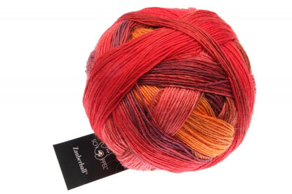 Ball of wool and nylon yarn in red and orange tones
