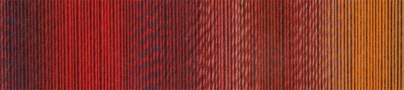 Up close image of red and orange yarn