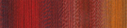 Up close image of red and orange yarn