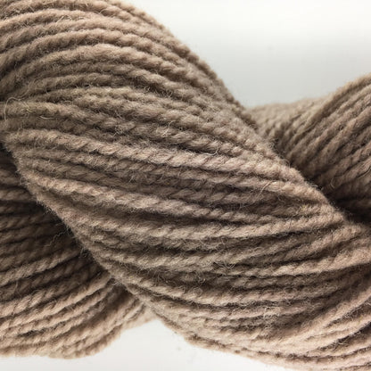 Close-up of a skein of light brown coloured wool yarn