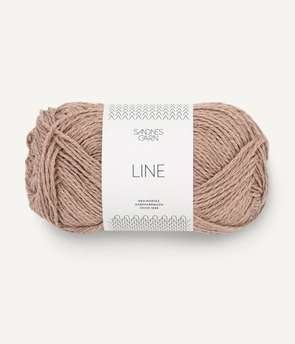 A ball of sandy coloured cotton/linen/viscose yarn labeled 'Line' by Sandnesgarn