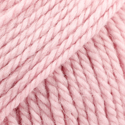 Close-up of powder pink wool and alpaca yarn from Drops
