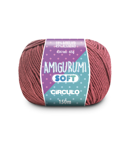A ball of dark rose pink acrylic and cotton blend yarn labeled 'Amigurumi (Soft)' by Circulo.