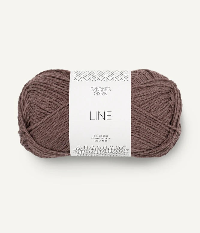A ball of medium brown coloured cotton/linen/viscose yarn labeled 'Line' by Sandnesgarn