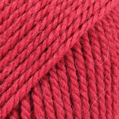 Close-up of pink-red wool and alpaca yarn from Drops