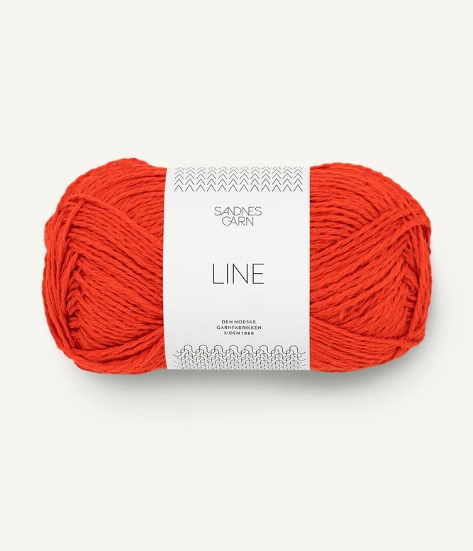 A ball of bright orange coloured cotton/linen/viscose yarn labeled 'Line' by Sandnesgarn