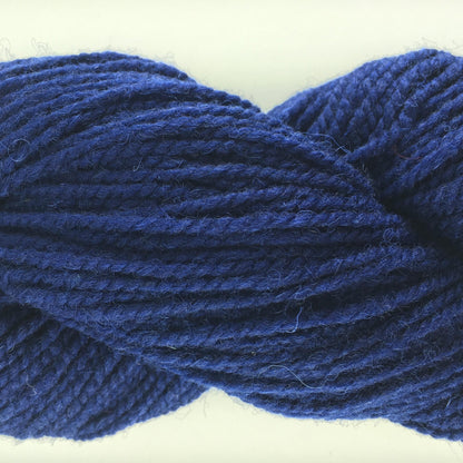 Close-up of a skein of navy coloured wool yarn
