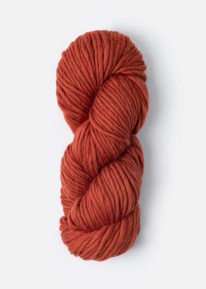 rusty-orange skein of highland wool