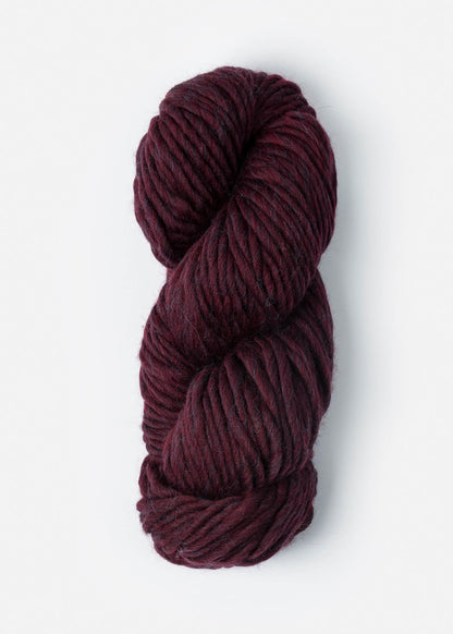 Deep red skein of highland wool yarn