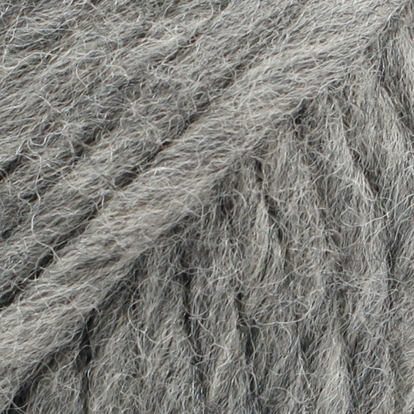 Close-up of a ball of medium grey-colored wool yarn from Drops