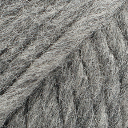 Close-up of a ball of medium grey-colored wool yarn from Drops