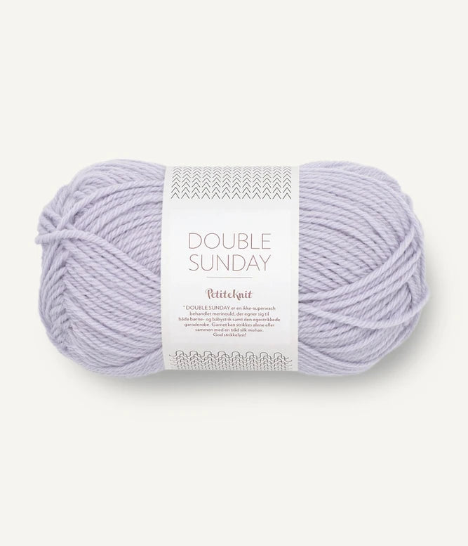 A ball of light purple coloured merino wool yarn labeled 'Double Sunday' by Sandnesgarn.