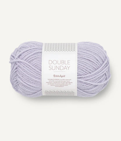 A ball of light purple coloured merino wool yarn labeled 'Double Sunday' by Sandnesgarn.