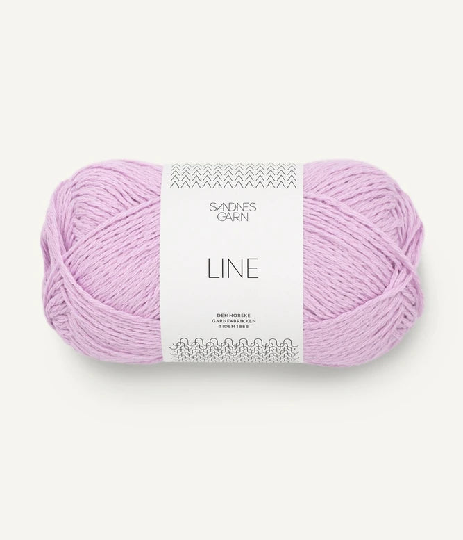 A ball of lilac coloured cotton/linen/viscose yarn labeled 'Line' by Sandnesgarn