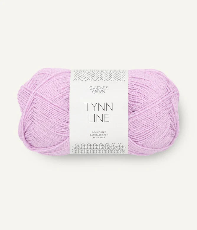 A ball of lilac cotton/linen/viscose yarn labeled 'TYNN LINE' by Sandnes Garn