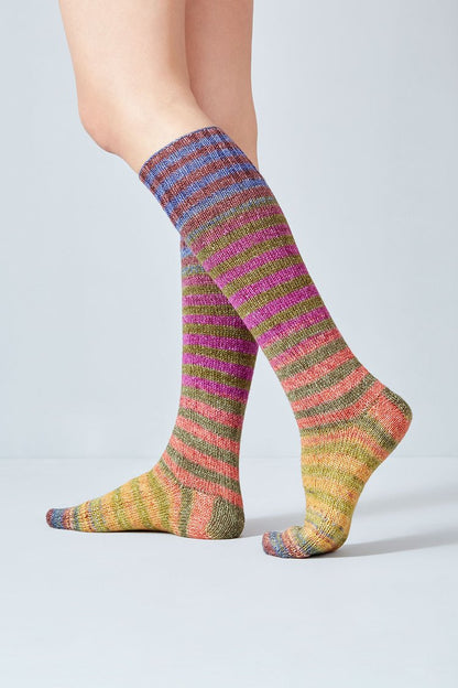 Merino and nylon knit pink, yellow, brown, and blue stripe socks from Urth