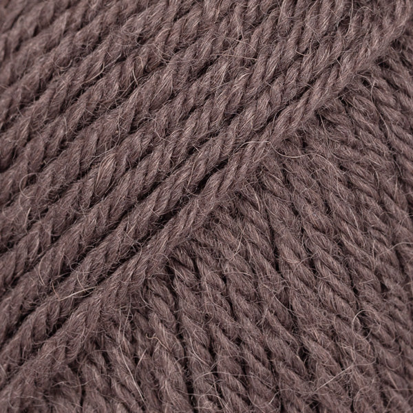 Close-up of walnut-brown wool and alpaca yarn from Drops