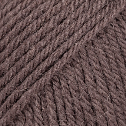 Close-up of walnut-brown wool and alpaca yarn from Drops