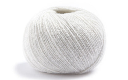 Bright White ball of merino wool and cashmere yarn from Lamana