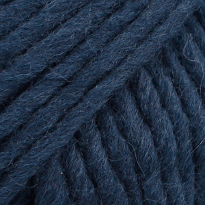 Close-up of a ball of navy blue-colored wool yarn from Drops
