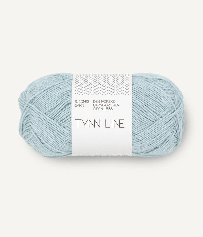 A ball of light blue cotton/linen/viscose yarn labeled 'TYNN LINE' by Sandnes Garn