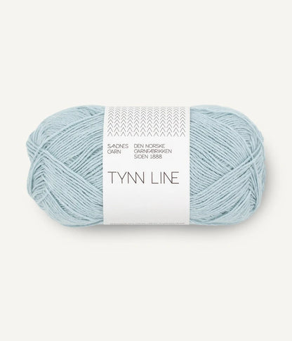 A ball of light blue cotton/linen/viscose yarn labeled 'TYNN LINE' by Sandnes Garn