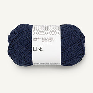 A ball of deep navy coloured cotton/linen/viscose yarn labeled 'Line' by Sandnesgarn