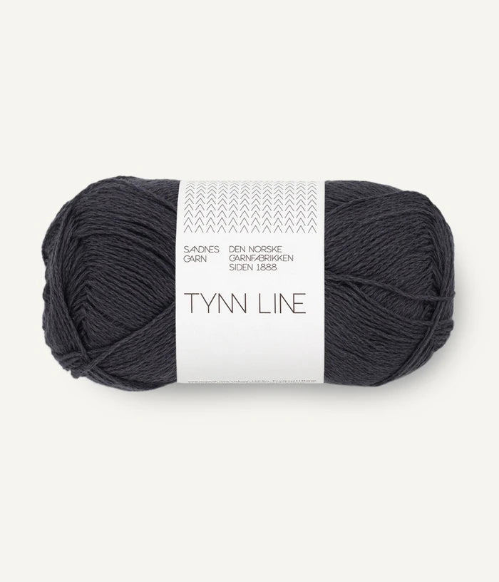 A ball of brown-grey cotton/linen/viscose yarn labeled 'TYNN LINE' by Sandnes Garn