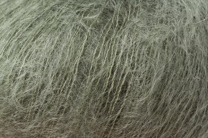 Close-up of light green mohair yarn from Rowan