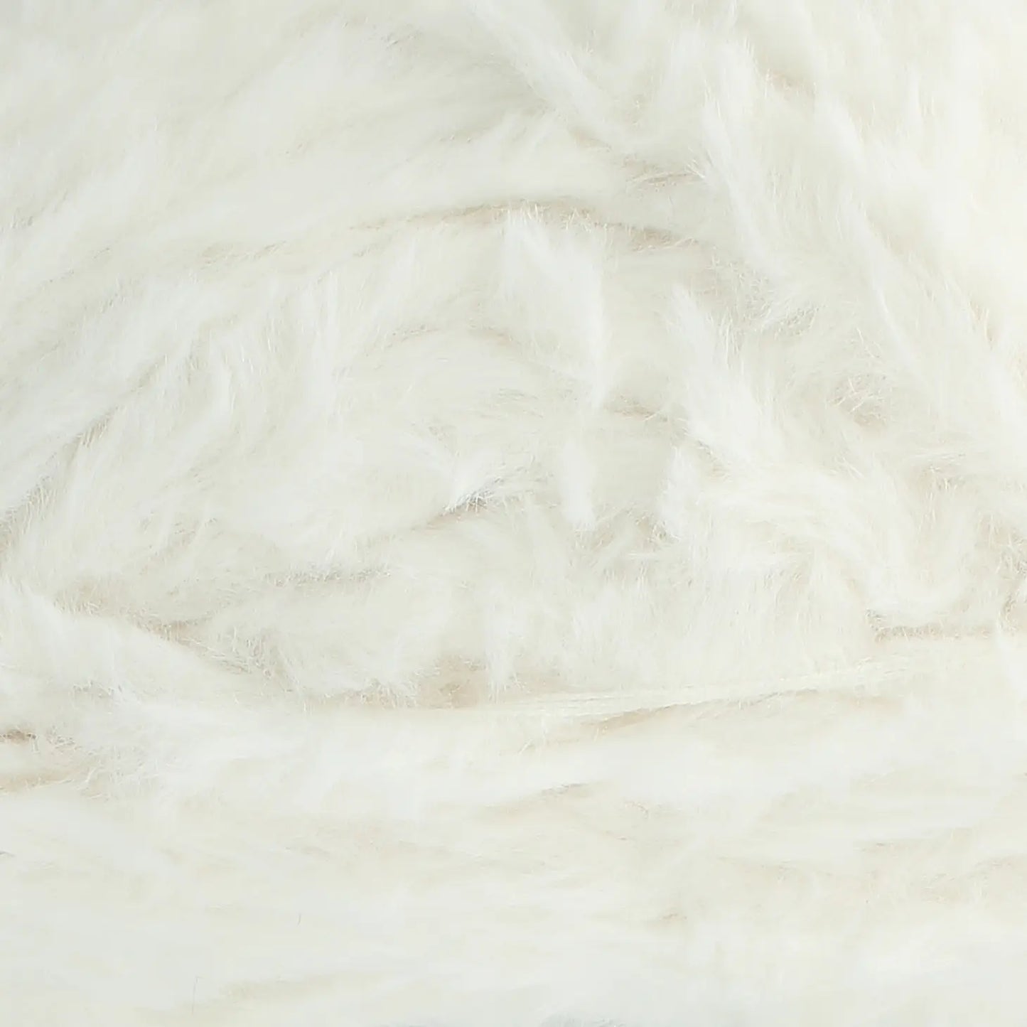 A skein of King Cole Velveteen polyester yarn in Velvet Snow white colour. 