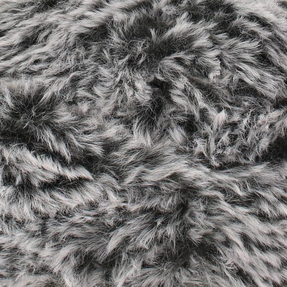 A skein of King Cole Velveteen polyester yarn in Shadowy Ash grey colour.