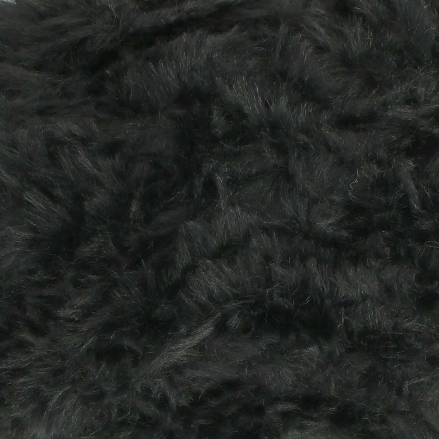 A skein of King Cole Velveteen polyester yarn in Dreamy Dust grey colour.