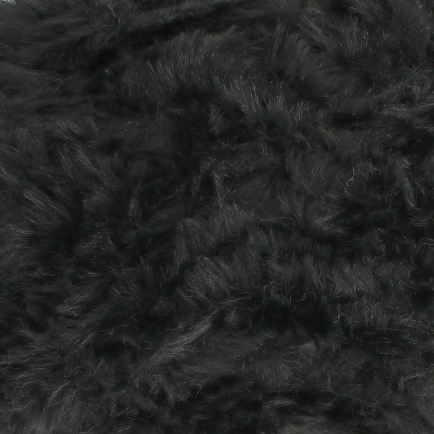 A skein of King Cole Velveteen polyester yarn in Dreamy Dust grey colour.