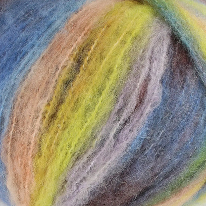 A close-up of acrylic, mohair, polyester, and wool yarn in blue, green, yellow, and brown colours