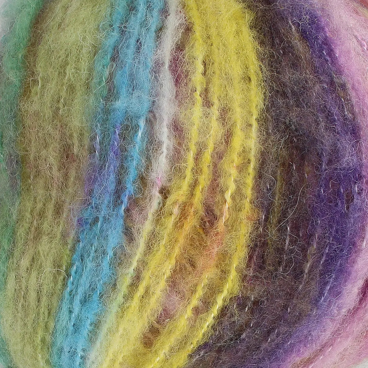 A close-up of acrylic, mohair, polyester, and wool yarn in yellow, pink, purple, green, and blue colours