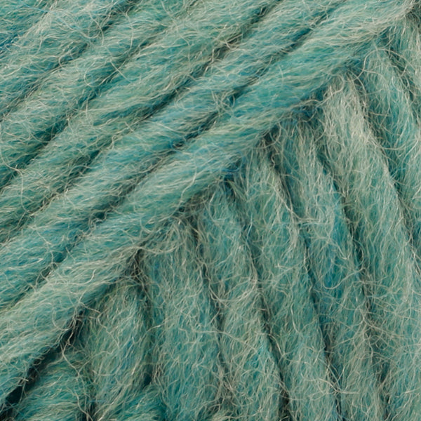 Close-up of a ball of sea green-colored wool yarn from Drops