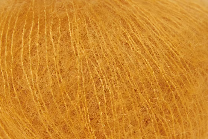 Close-up of yellow mohair yarn from Rowan