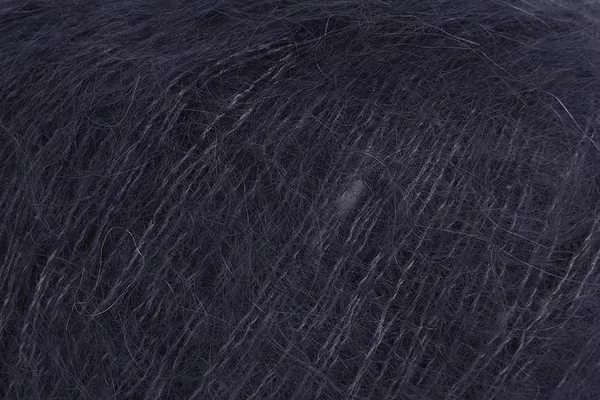 Close-up of dark brown mohair yarn from Rowan