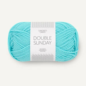 A ball of turquoise coloured merino wool yarn labeled 'Double Sunday' by Sandnesgarn.