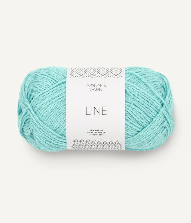 A ball of turquoise coloured cotton/linen/viscose yarn labeled 'Line' by Sandnesgarn