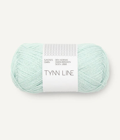 A ball of mint green cotton/linen/viscose yarn labeled 'TYNN LINE' by Sandnes Garn