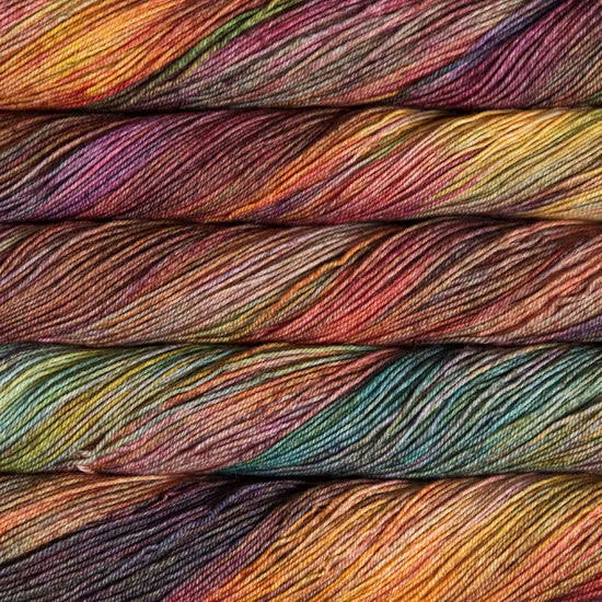Multicolored yarn skeins stacked on top of each other