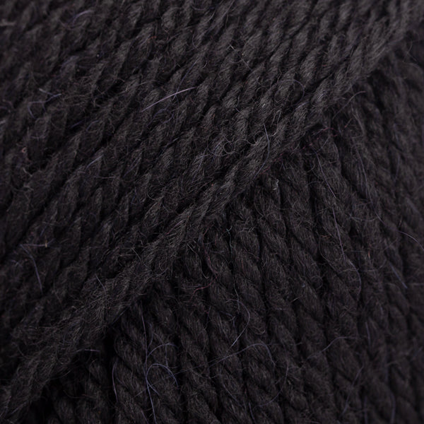 Close-up of black wool and alpaca yarn from Drops