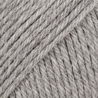 Close-up of pale grey wool and alpaca yarn from Drops