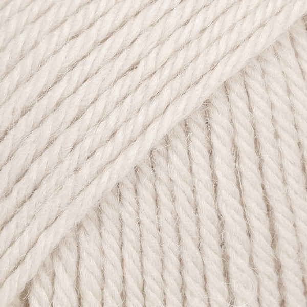 Close-up of light off-white wool and alpaca yarn from Drops