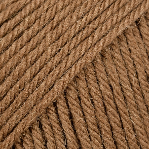 Close-up of light chestnut wool and alpaca yarn from Drops