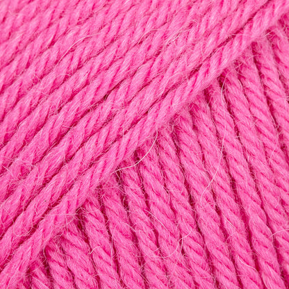 Close-up of bright pink wool and alpaca yarn from Drops