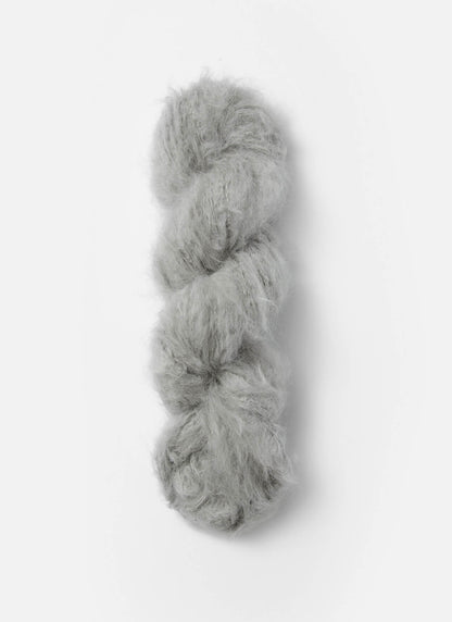A light grey skein of brushed suri, merino, and bamboo yarn from Bluesky Fibers